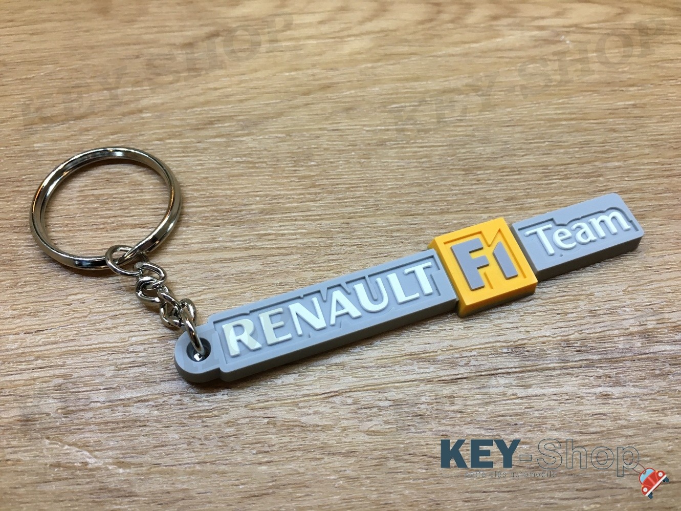 Porte clés PVC souple Renault F1 Team logo vue 2